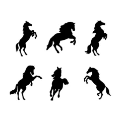 Fototapeten Set of horse silhouette animal set isolated on white background. Black horses graphic element vector illustration © blessed.grapix