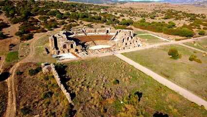 aerial view of the roman theatre and ruins in Conjunto Arqueológico Baelo Claudia museum in Bolonia, Tarifa, Andalusia, Spain