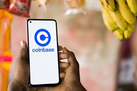 Dhaka, Bangladesh - 14 March 2024: Coinbase logo on smartphone. Coinbase is an American publicly traded company that operates a cryptocurrency exchange platform.