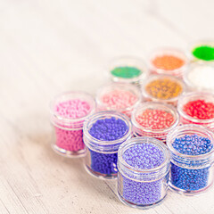 Colorful glass beads. Variety of shapes and colors to make a bead necklace or a string of beads for women