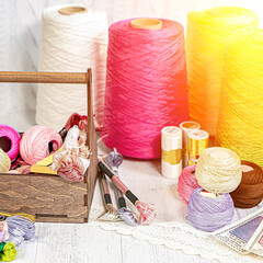 Threads in reels. Colored bobbins for embroidery knitting hobby accessories creativity.