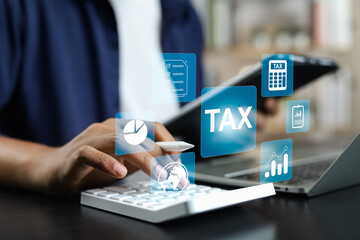 Tax and Vat concept. Government, state taxes concept. Businesman using tablet and laptop to...