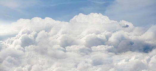 Naklejka na ściany i meble Blue sky background with tiny clouds. Panoramic view from airplane window.
