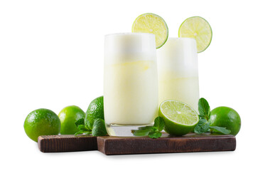 Brazilian Lemonade, Refreshing Creamy Lemonade or Limeade with Lime Slices and Mint on White Isolated - obrazy, fototapety, plakaty