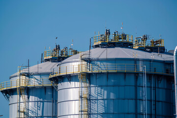 The storage tanks of a modern oil refinery