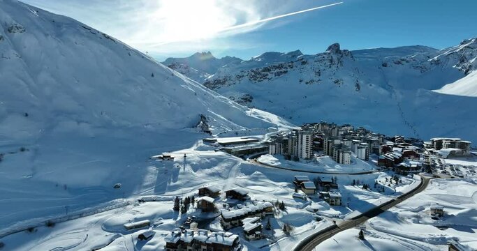 Winter drone shot of ski pistes and slopes covered with fresh powder snow in Tignes in Valdisere France
