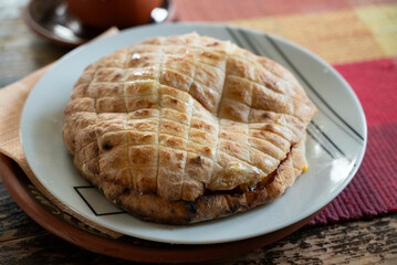 Lepinja, a traditional flat bread from Serbia, a yeast-raised, spongy flatbread that's popular all over the Balkans and similar to pide or pitta. 