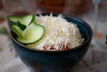 Shopska salad, a cold salad popular throughout Southeastern Europe. This is Bulgaria's most famous salad and national dish, whose colors recall the Bulgarian flag