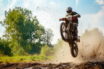 Fotobehang Motocross rider on the race on the mud. Extreme motocross. Motocross. Enduro. Extreme sport concept. © John Martin