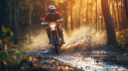Abwaschbare Fototapete Motocross rider on a motorcycle in the forest at sunset. Motocross. Enduro. Extreme sport concept. © John Martin