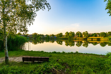 Lake in the village. Background with selective focus and copy space