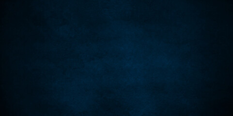 Blue wall stone background with grunge texture. old vintage retro rough watercolor painted mottled blue background. rock stone wall bright ink and watercolor textures on black paper background.