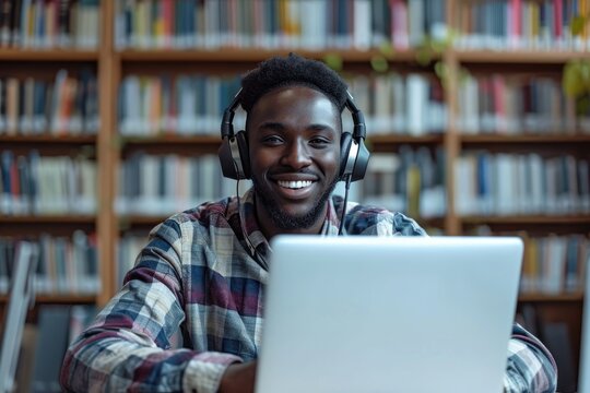 African man using a laptop and donning headphones. Generative Ai.