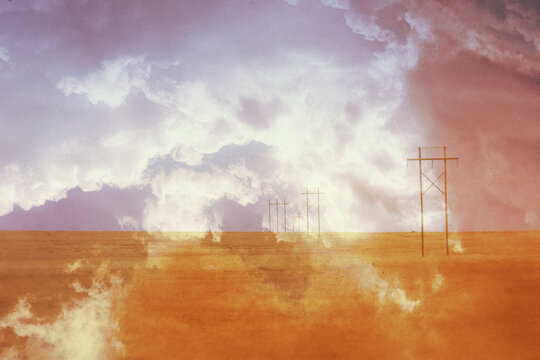 double exposure of power station and clouds