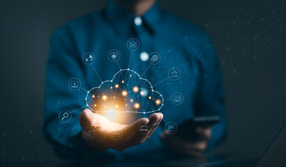 Cloud computing technology concept. Businessman hand holding cloud computing icon network. download...