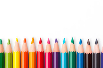 Colored pencils on a white background with copy space.
