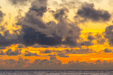 Amazing sunset or sunrise sky over sea landscape,Beautiful colorful light of nature with boats in the sea,Majestic nature view seascape