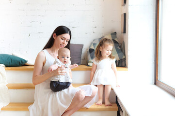 two women drinking coffee