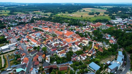 Aerial around the old town of the city Tirschenreuth in Bavaria on a cloudy day in summer