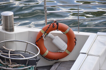 Life orange buoy on the boat