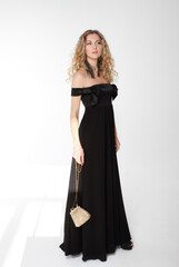 Naklejka premium Beauty young blond girl with curly hair