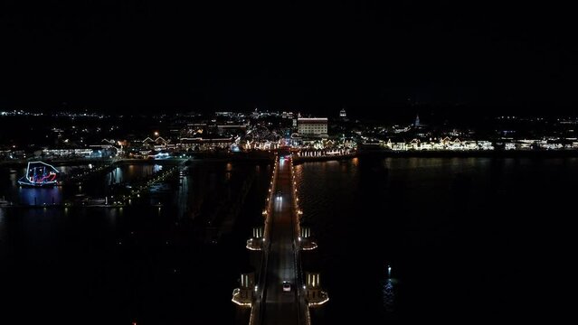 Night aerial rise St Augustine Florida over Bridge of Lions 4k