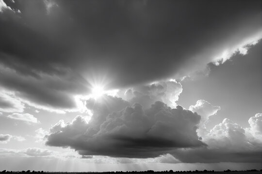 A black and white photo of a cloudy sky
