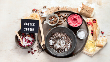 A woman's hand applies a natural coffee scrub. Skin care cosmetics. Beauty concept