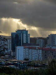 Rays of Hope over the Urban Skyline