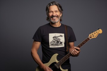 Portrait of a grinning man in his 40s sporting a vintage band t-shirt with a guitar against a plain white digital canvas. AI Generation