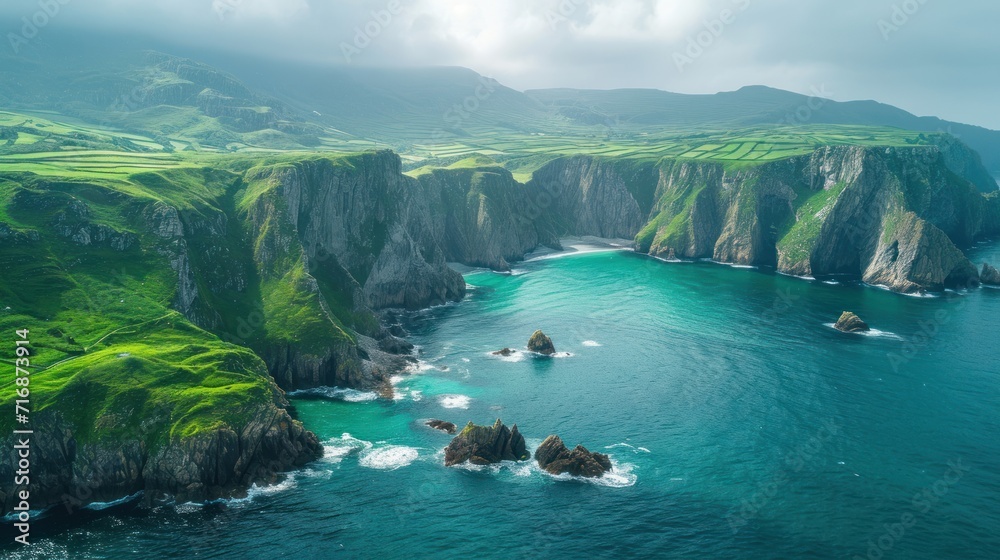 Poster  an aerial view of a body of water surrounded by green hills and a rocky coastline with green grass growing on the sides of the cliffs and a body of water in the foreground.