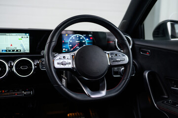 Modern Luxury Car Steering Wheel with buttons and digital display