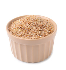 Dry wheat groats in bowl isolated on white