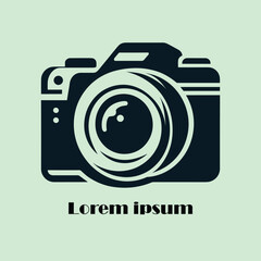 A camera with a lens on a green background