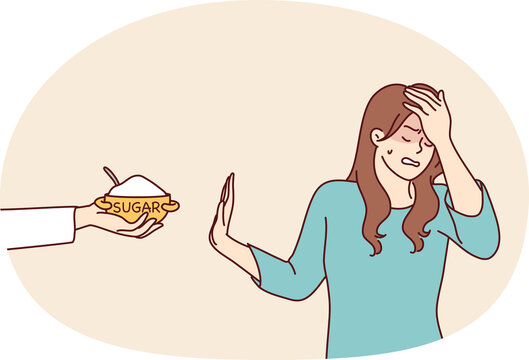 Embarrassed woman makes stop gesture rejecting proposed sugar that can harm health. girl touches forehead with hand trying to avoid eating sweety foods for dieting.