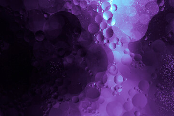 abstract background with purple liquid and glowing lights