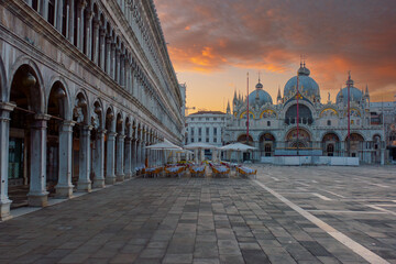 View of Basilica di San Marco and on piazza San Marco( St. Mark Square) at sunrise in Venice, Italy.  - obrazy, fototapety, plakaty