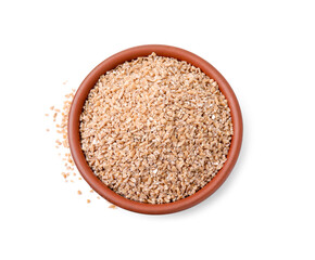 Dry wheat groats in bowl isolated on white, top view