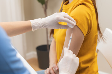 Health care, corona virus, hand of woman nurse, doctor giving syringe vaccine, injection dose on...