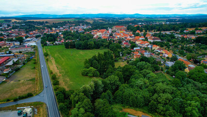 Aerial view around the city Horsovsky Tyn on a cloudy afternoon in late Spring in Czechia