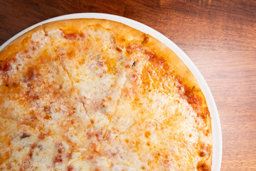 Cheese pizza on a table