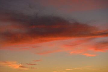 Naklejka na ściany i meble A sunset heaven, orange sky. Sun Rays