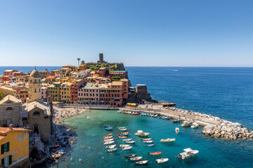 Vernazza, Italy - August 1st, 2023: View of Vernazza village, one of the cinque terre, by the sea,...