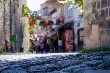 Stone path and old street bazaar blurred in Safranbolu Turkey, selective focus