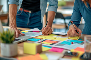 Obraz premium Productive Teamwork As Colleagues Creatively Plan And Strategize Together With Sticky Notes