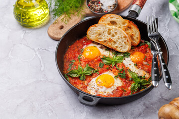 Delicious shakshuka breakfast in a pan