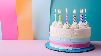 Multicolored Birthday Cake With Lit Candles