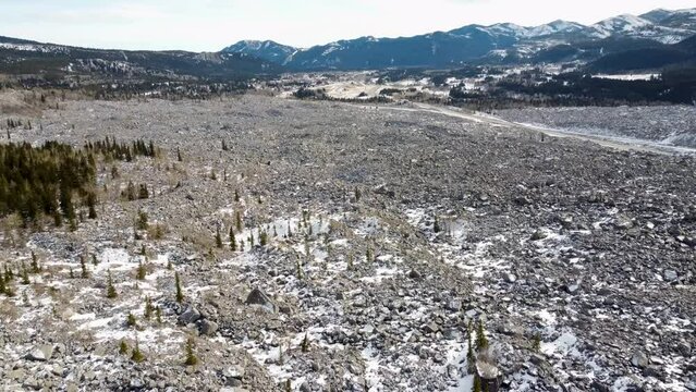 valley covered in rock slide debris - Frank Slide aftermath, Canada