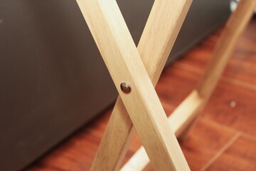 Close up of a wooden table legs