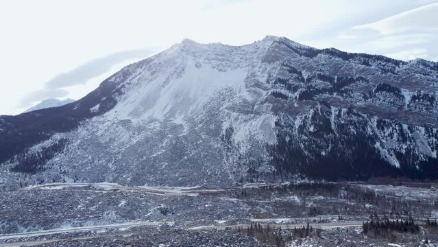 Snow-covered rock face after rockslide